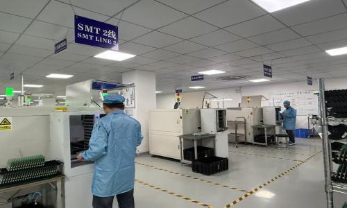 SMT circuit board assembly line with operator and automated equipment