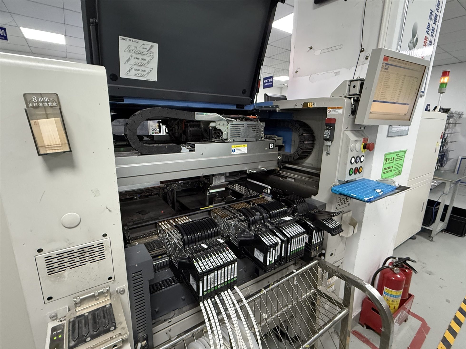 Automated component placement machine on a PCB assembly line