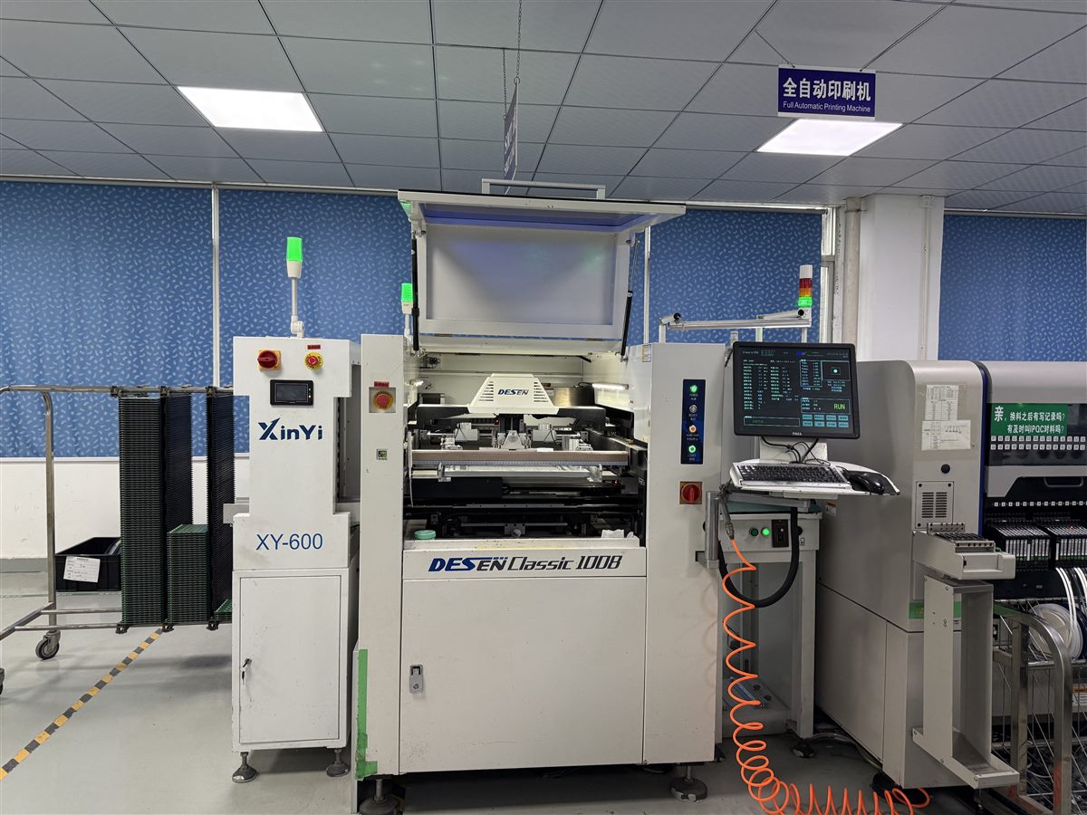 SMT placement equipment on a PCB assembly production line