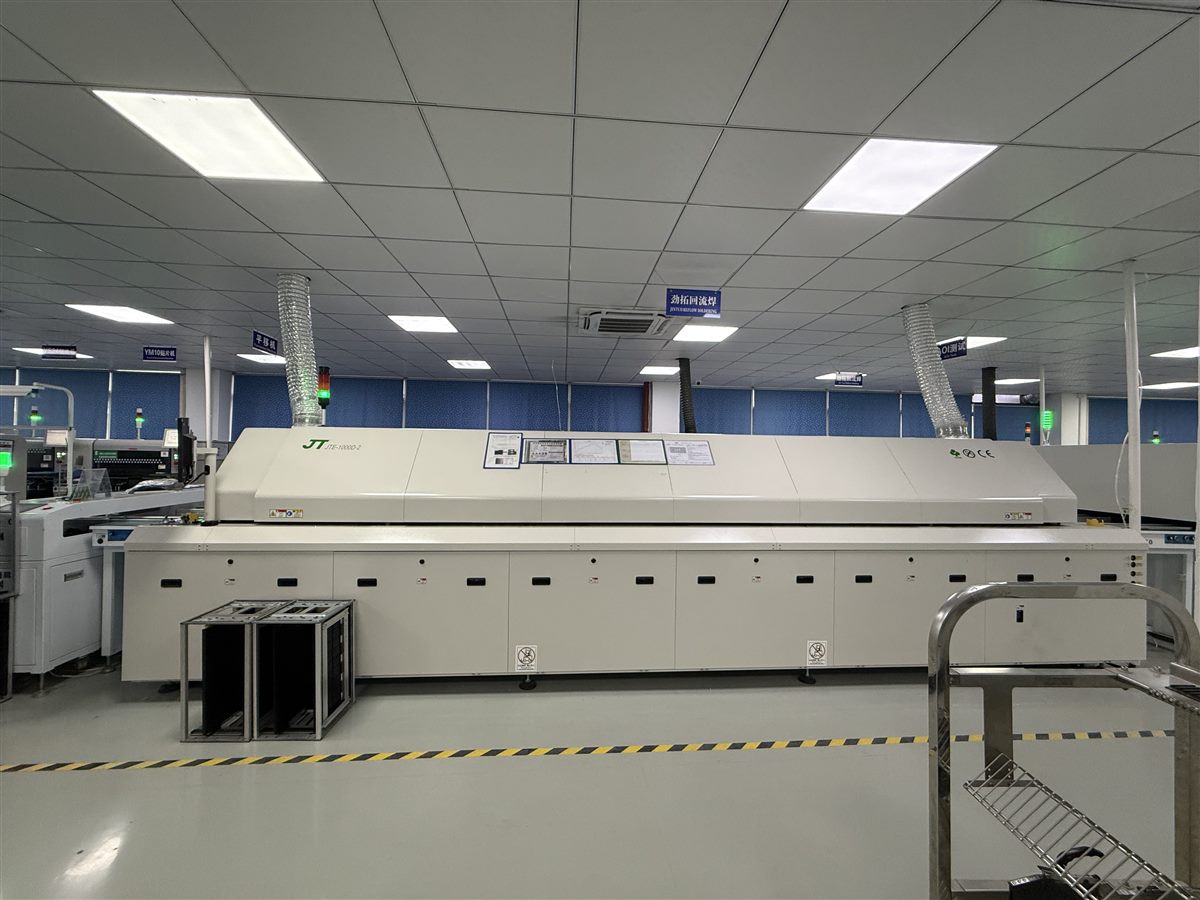 Reflow soldering equipment in a PCB assembly facility