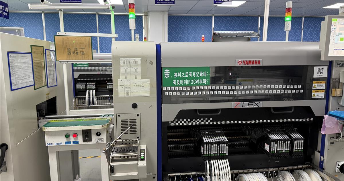 SMT placement equipment with component feeders in a PCB assembly factory